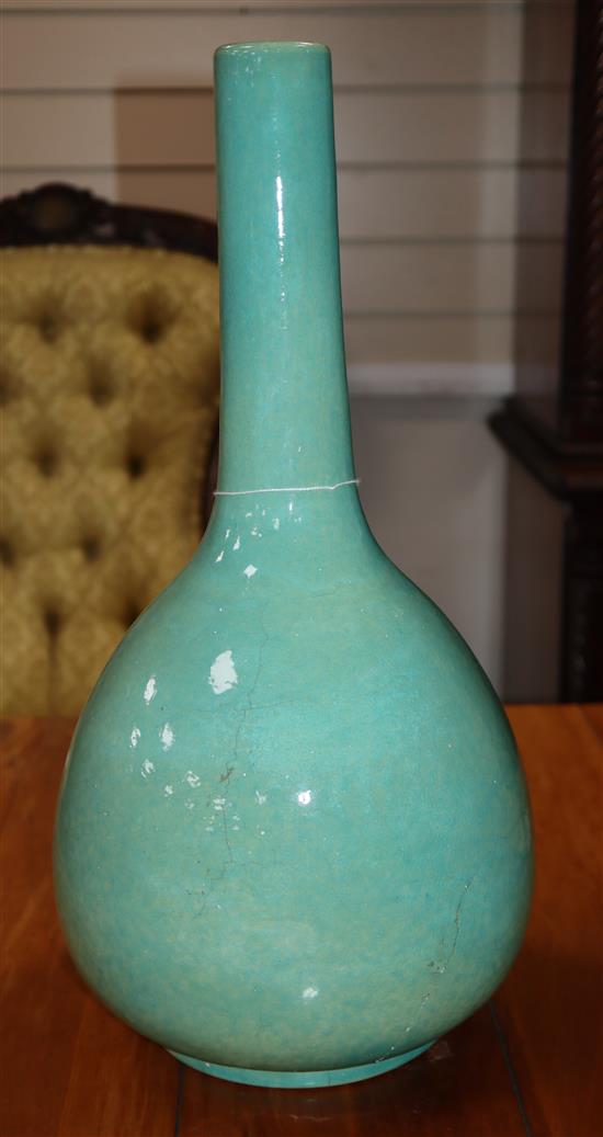 A large Chinese turquoise crackle-glazed bottle vase, incised Kangxi mark but later height 43cm